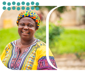 Smiling woman in traditional African clothing