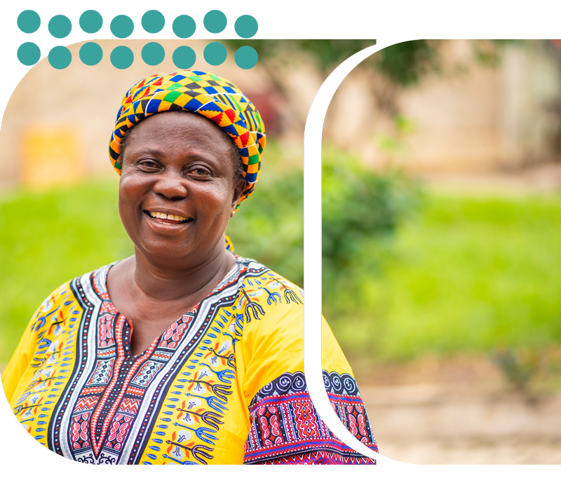 Smiling woman in traditional African clothing