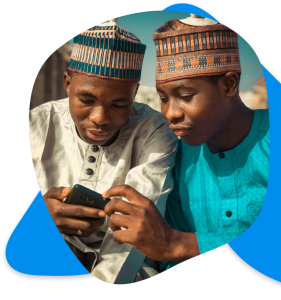 Two young men using technology