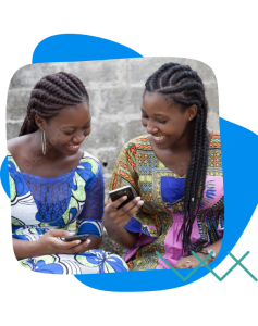 Two women using mobile phones