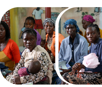 African women holding children